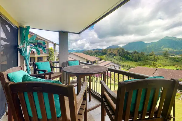 Enjoy morning coffee and sweeping mountain views from the balcony