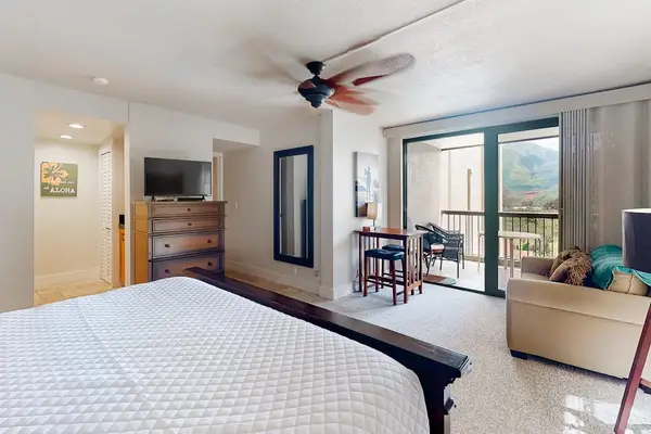 Spacious bedroom provides a relaxing setting for slow vacation mornings