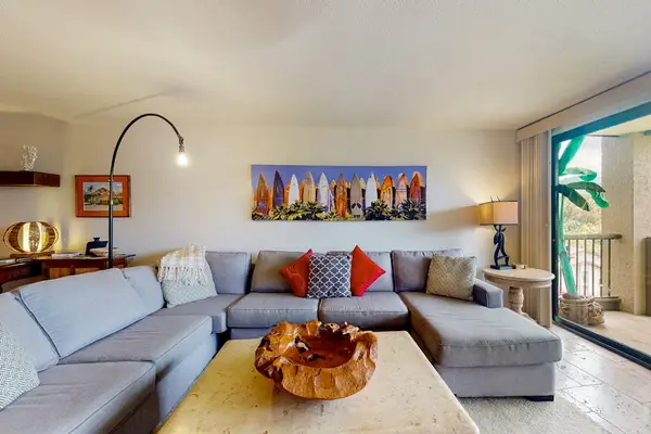 Spacious living room offers comfortable seating for relaxing together indoors