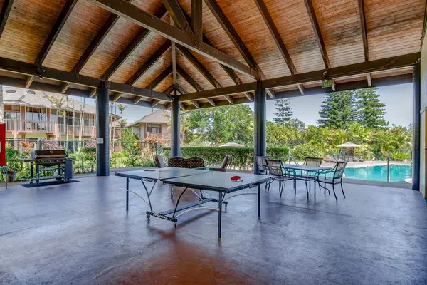 Clubhouse Pavilion Featuring Outdoor Table Tennis & Poolside Dining