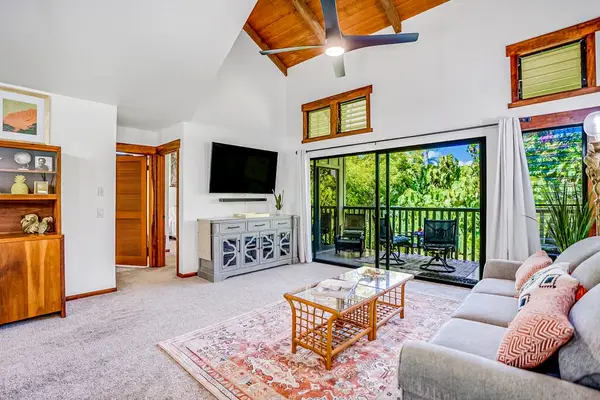This open concept living and vaulted ceilings gives a welcoming feel.  Natural light streams in from the lanai doors.