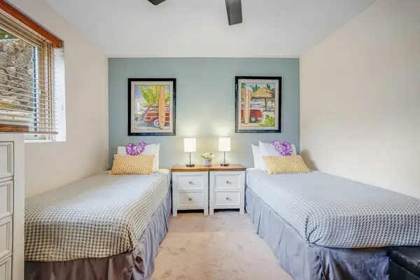 Two cozy twin beds make this room ideal for families or friends