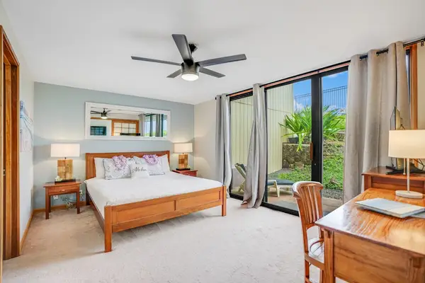 Large bedroom with natural lighting
