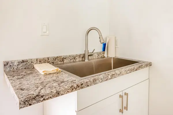 Modern Kitchenette With Granite Counters