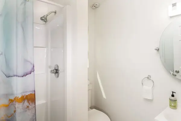 Bright Bathroom With Walk In Shower
