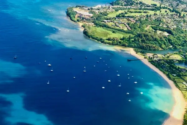 Stunning aerial view showcases turquoise waters and beautiful tropical coastline