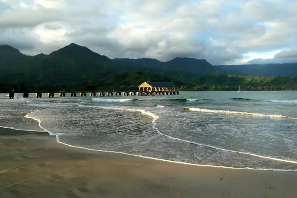 Enjoy dramatic mountain scenery meeting the calm and peaceful shoreline