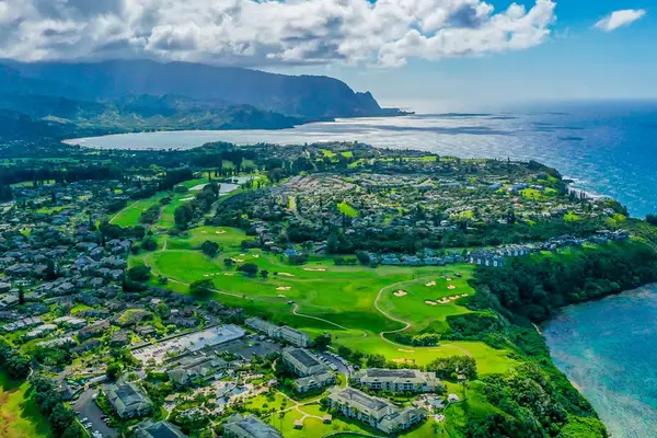 Panoramic Aerial View of Princeville Coastline, Golf Course & Mountains