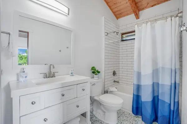 Primary bathroom with walk-in shower for refreshing mornings