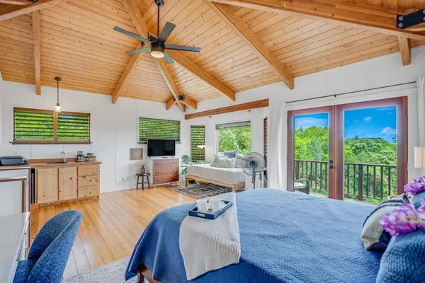 Spacious king bedroom with natural light for relaxing