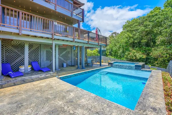 Soak up sunshine beside the sparkling blue water