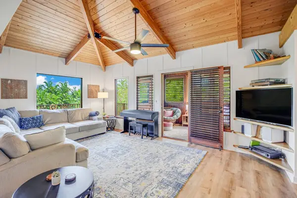 Spacious living room with smart TV for movie nights