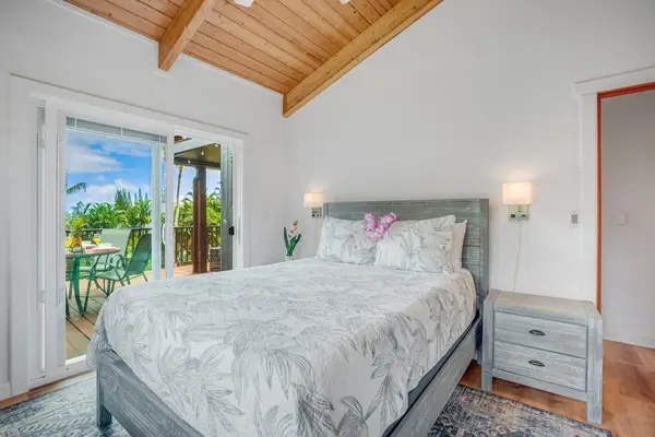 Queen bedroom with bedside tables for added convenience