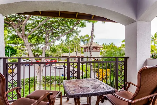 Covered Lanai Surrounded By Lush Greenery
