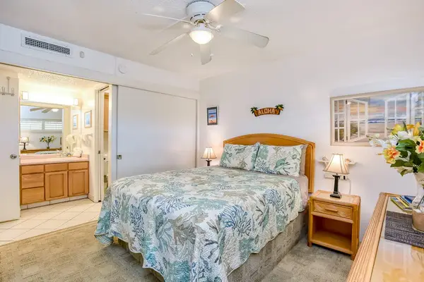 Peaceful queen bedroom with ample storage