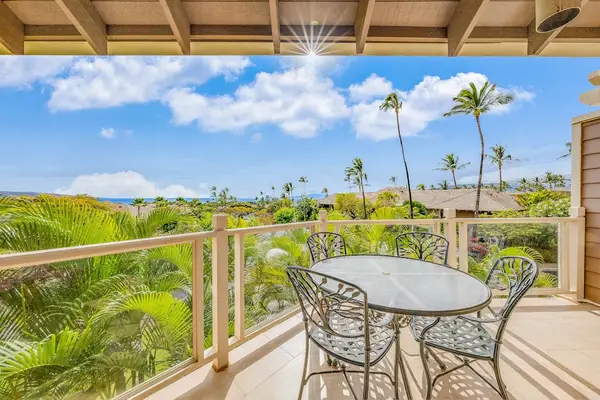 Covered Lanai with Outdoor Dining Table Set & Scenic Tropical Views