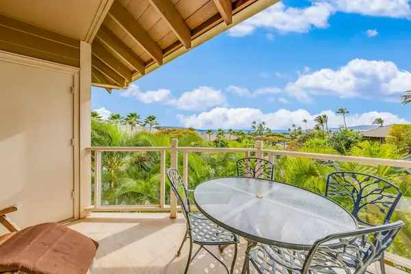 Spacious Lanai View with Seating, Sunny Sky & Panoramic Ocean Backdrop