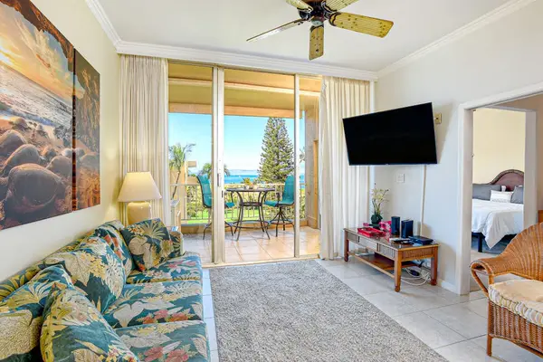 Unwind into vacation mode on a sleeper sofa in the living area. In the evening, kick back and stream a movie on the 65” smart TV. Slide open the glass door to the lanai for the soothing sound of the surf.