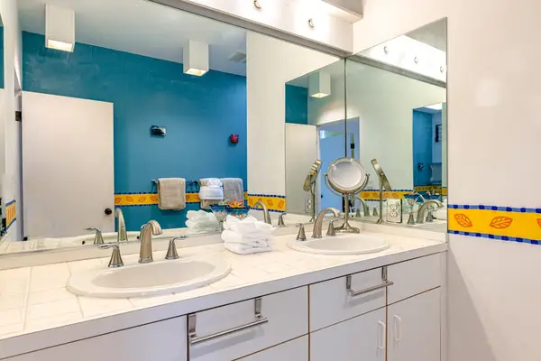 Fresh Coastal Bathroom With Double Vanity