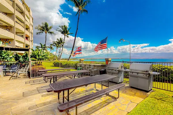 Island Sand Resorts Community Pool with grills and seating for a feast while you swim and hear the ocean.