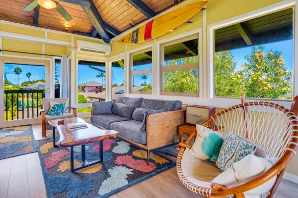 Living room with panoramic views comfortable seating and a flat screen tv.