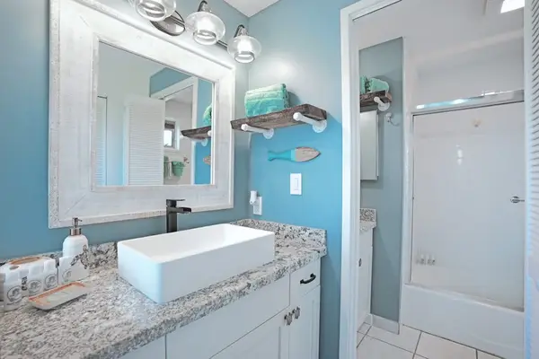 Master bathroom with tub/shower combo.