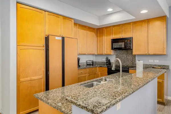 Chef's Kitchen With Granite Island