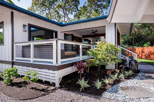 Exterior View of Raised Deck, Covered Lanai & Landscaped Yard