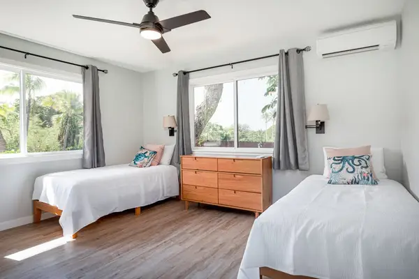 Spacious Twin Bedroom with Dual Beds, Dresser & Dedicated AC