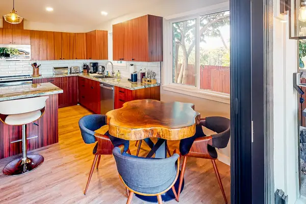 Dining Area with Live-Edge Table & Open Kitchen View