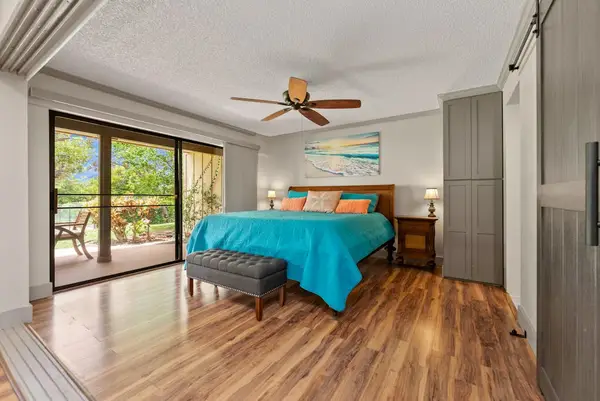 First bedroom with a bright, inviting view for a refreshing stay