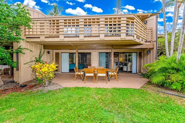 Ground-floor patio opens onto peaceful tropical gardens and outdoor seating