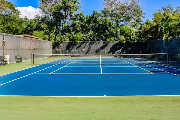 Enjoy a friendly match on Kihei Akahi's well-maintained tennis courts, surrounded by lush tropical landscaping and beautiful island sunshine.