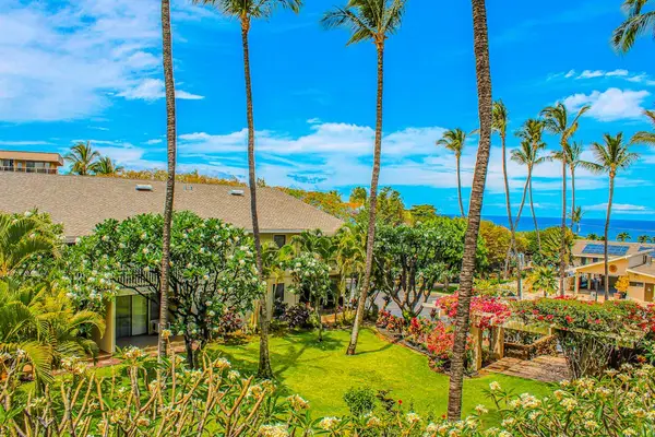 Palm-Lined Gardens Beside The Shore