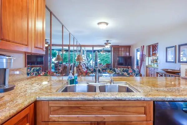Kitchen Island Sink & Open View to Living Area