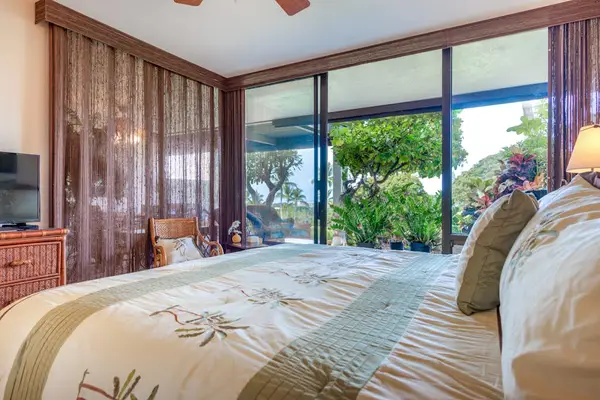 Bedroom View Looking Out to Tropical Lanai & Gardens