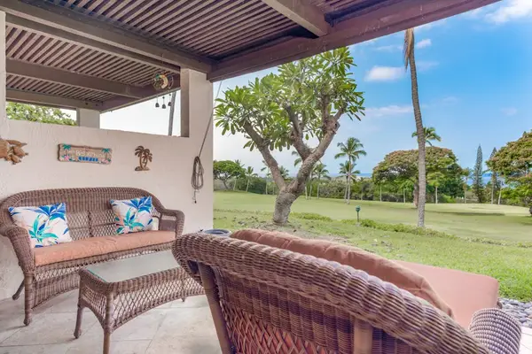 Covered Lanai Lounge with Scenic Lawn & Garden Views
