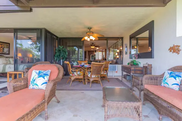 Covered Lanai Lounge with Tropical Outdoor Seating