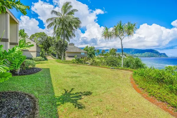 Scenic exterior setting combines open landscapes, gardens, and clear skies
