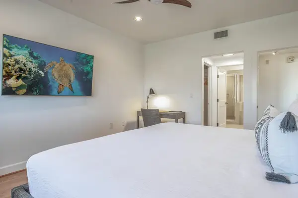 Primary Bedroom View Featuring Dedicated Work Workspace and En-Suite Access