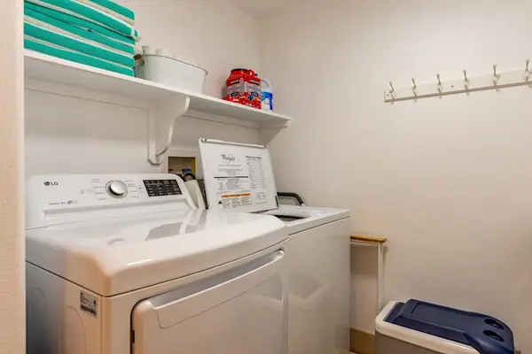 In-Unit Laundry Room with Full-Size Washer and Dryer