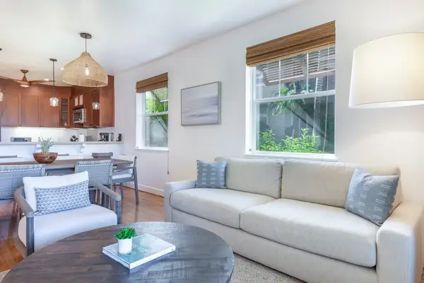 Open Living Room View facing Dining Area and Kitchen