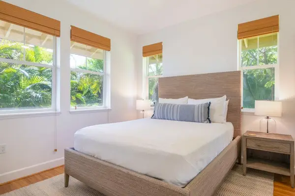 Secondary Bedroom with Queen Bed and Natural Light