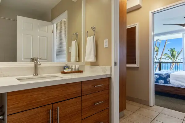 Bright En Suite Vanity Station Stocked With Fresh Amenities