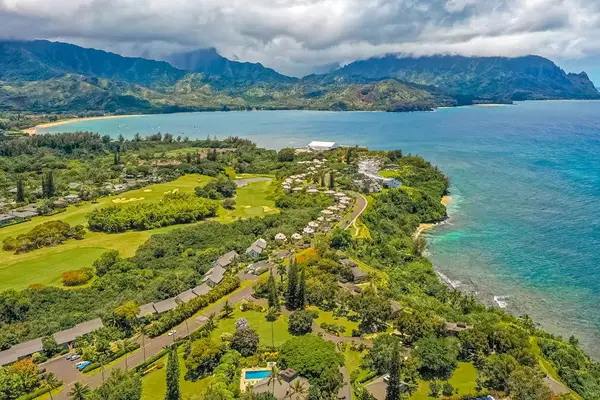 Aerial Coastal Paradise With Endless Blue Waters