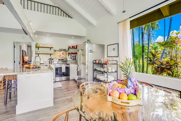 Open kitchen with breakfast seating