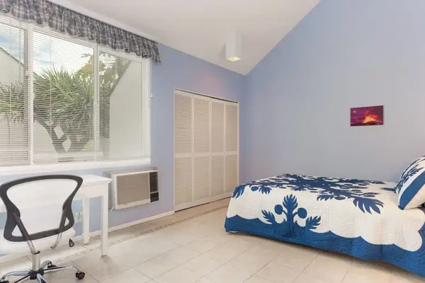 Bright bedroom offers peaceful comfort for relaxing nights and refreshing morning wakeups daily