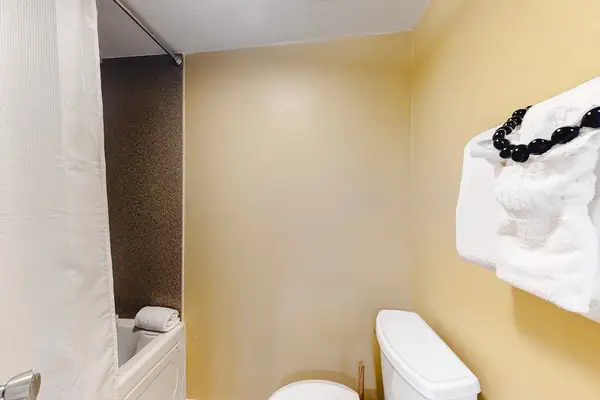 Convenient bathroom provides everything needed for comfortable daily routines here