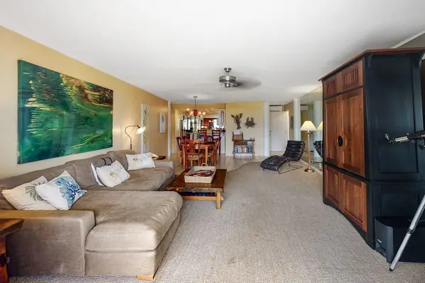 Spacious living room offers comfortable seating for relaxing vacation moments