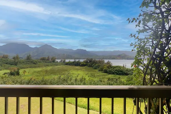 Admire sweeping green landscapes and distant mountains from your balcony